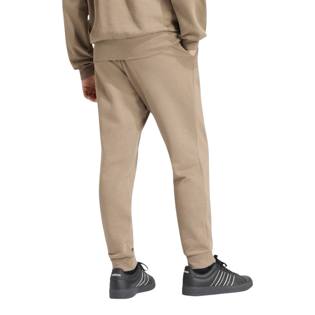 Jogger Adidas ESS felpato - beige